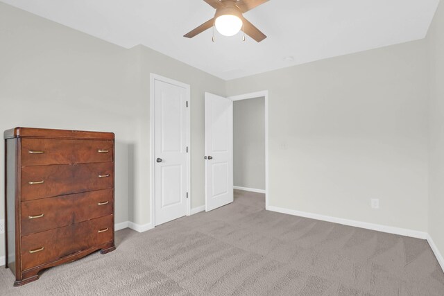 9785 Black Willow Ln, Ladson, SC 29456 - unfurnished bedroom featuring carpet flooring, baseboards, and ceiling fan