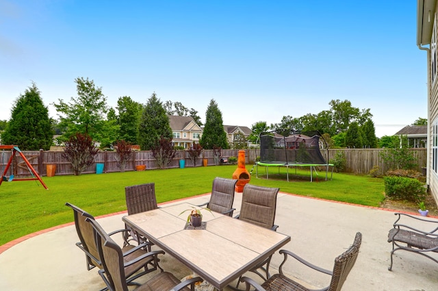 9785 Black Willow Ln, Ladson, SC 29456 - view of patio with a trampoline, outdoor dining area, and a playground