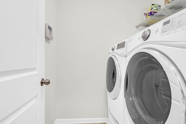 9785 Black Willow Ln, Ladson, SC 29456 - laundry area featuring independent washer and dryer and baseboards