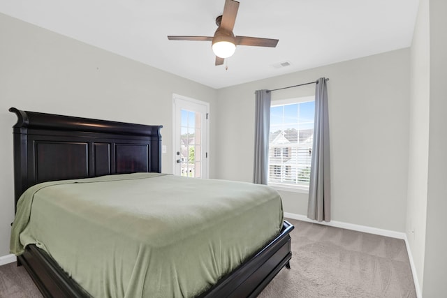 9785 Black Willow Ln, Ladson, SC 29456 - carpeted bedroom with baseboards and a ceiling fan