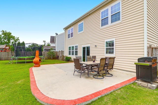 9785 Black Willow Ln, Ladson, SC 29456 - view of patio featuring a trampoline and area for grilling