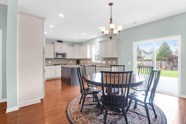 9785 Black Willow Ln, Ladson, SC 29456 - dining room featuring a chandelier, light wood-style floors, recessed lighting, and baseboards
