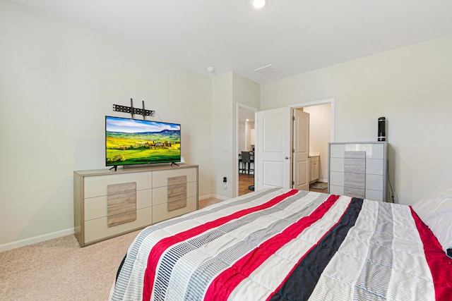 bedroom featuring light colored carpet