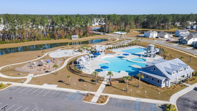 birds eye view of property featuring a water view