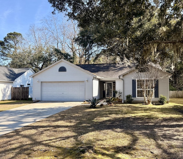 ranch-style home with a front yard, concrete driveway, fence, and an attached garage