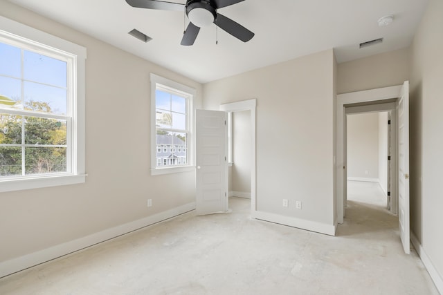 unfurnished bedroom featuring ceiling fan