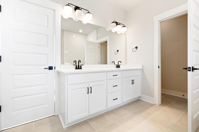 bathroom featuring vanity and tile patterned flooring