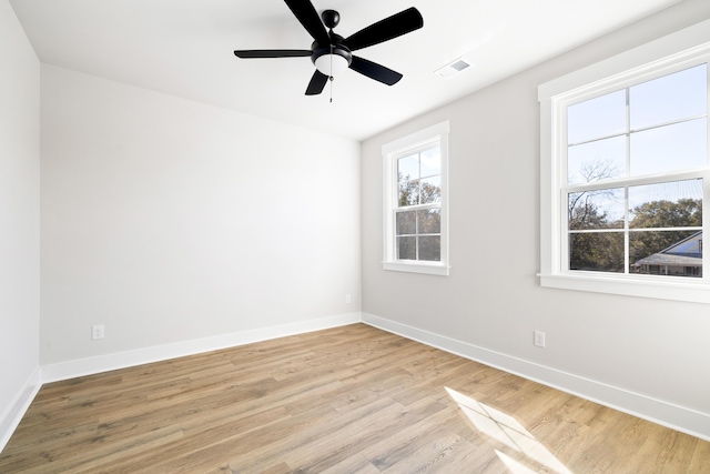 unfurnished room featuring ceiling fan and light hardwood / wood-style flooring