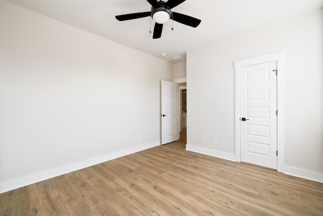 unfurnished bedroom featuring ceiling fan and light wood-type flooring