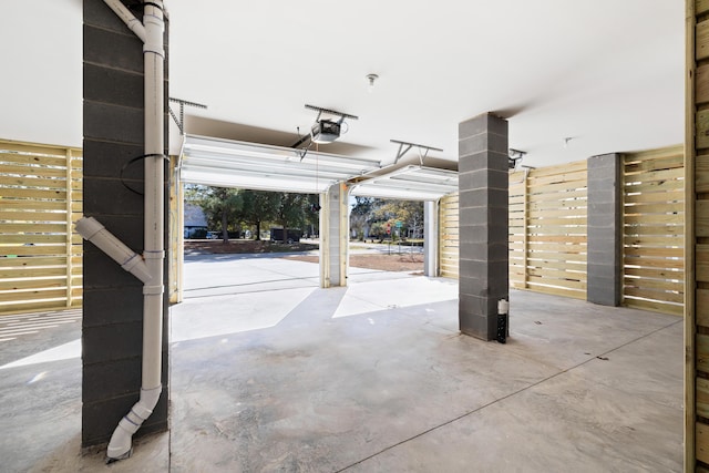 garage featuring a garage door opener