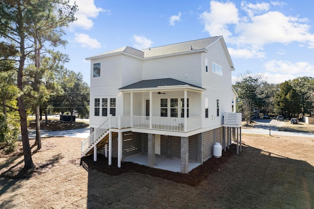 rear view of house with a patio and ceiling fan