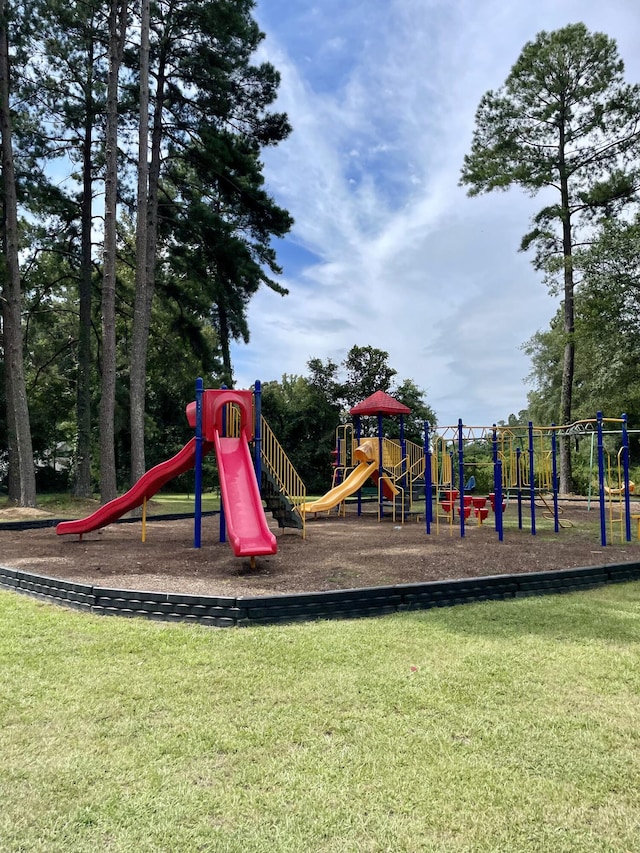 view of jungle gym featuring a yard