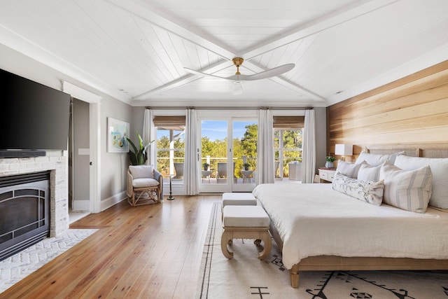 1635 Bull Creek Ln, Charleston, SC 29414 - bedroom featuring light wood-style floors, baseboards, access to exterior, multiple windows, and wooden ceiling with exposed beams