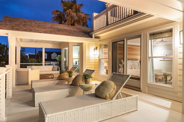 1635 Bull Creek Ln, Charleston, SC 29414 - patio at night with a balcony and an outdoor living space