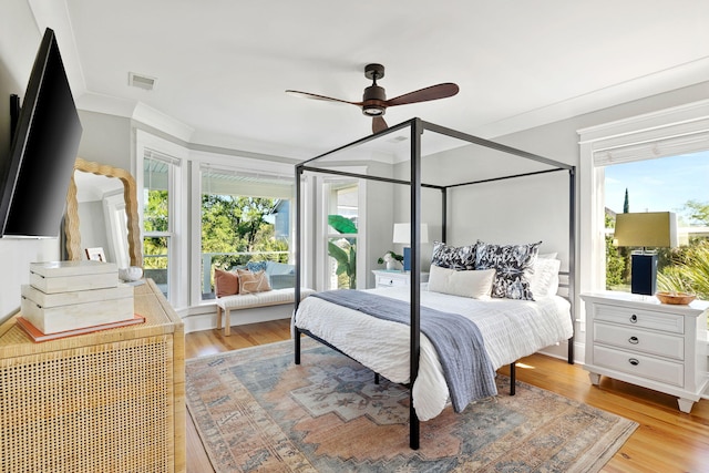 1635 Bull Creek Ln, Charleston, SC 29414 - bedroom with ornamental molding, light wood-style flooring, and ceiling fan