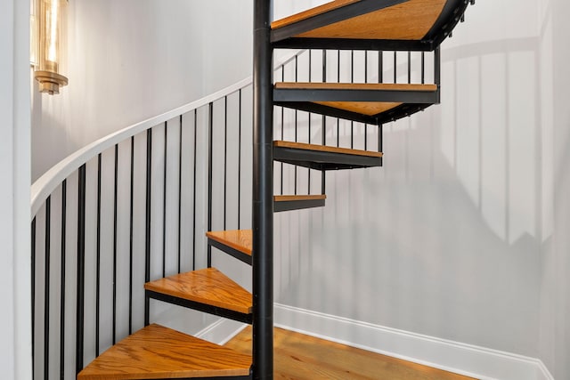 1635 Bull Creek Ln, Charleston, SC 29414 - staircase with wood finished floors and baseboards