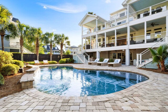 1635 Bull Creek Ln, Charleston, SC 29414 - view of swimming pool featuring a ceiling fan, stairway, a patio area, and an outdoor hangout area