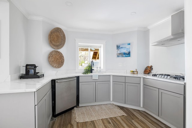 1635 Bull Creek Ln, Charleston, SC 29414 - kitchen with wall chimney range hood, stainless steel appliances, gray cabinetry, wood finished floors, and ornamental molding