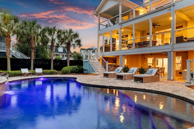 1635 Bull Creek Ln, Charleston, SC 29414 - view of swimming pool featuring ceiling fan, stairway, a patio, and an outdoor living space