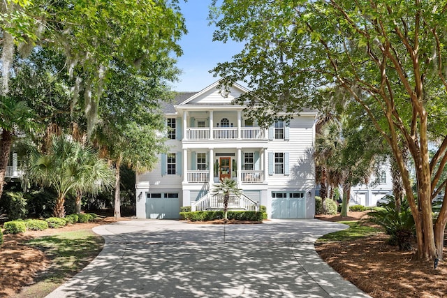 1635 Bull Creek Ln, Charleston, SC 29414 - view of front of house with stairs, a balcony, a garage, and covered porch