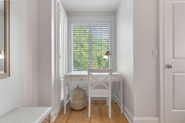 bedroom featuring ceiling fan and light hardwood / wood-style floors