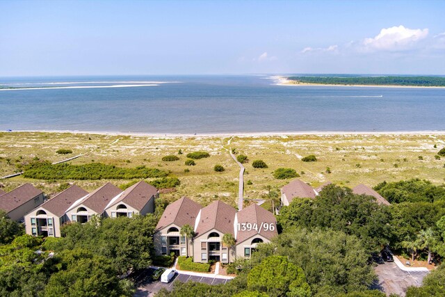 drone / aerial view with a view of the beach and a water view