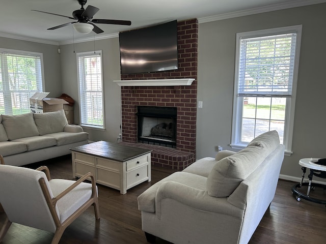 8701 Caspiana Ln, North Charleston, SC 29420 - living room with ornamental molding, dark wood-type flooring, a ceiling fan, and a brick fireplace