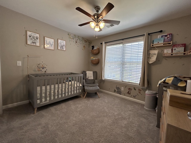 8701 Caspiana Ln, North Charleston, SC 29420 - bedroom featuring carpet floors, a crib, and a ceiling fan