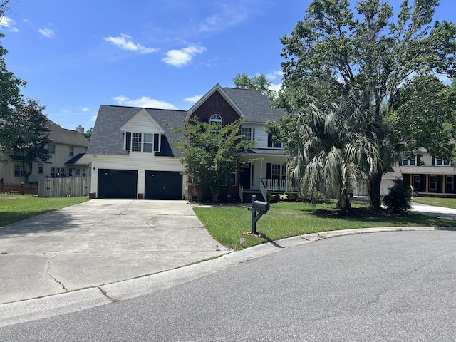 8701 Caspiana Ln, North Charleston, SC 29420 - view of front facade featuring concrete driveway, an attached garage, and a shingled roof