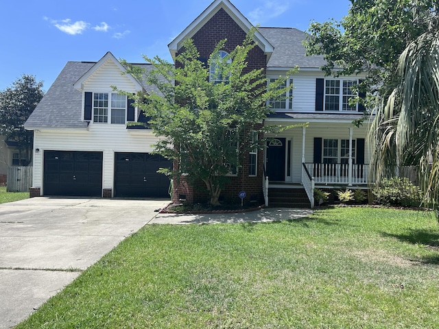 8701 Caspiana Ln, North Charleston, SC 29420 - traditional-style home with a garage, a porch, concrete driveway, a front yard, and roof with shingles