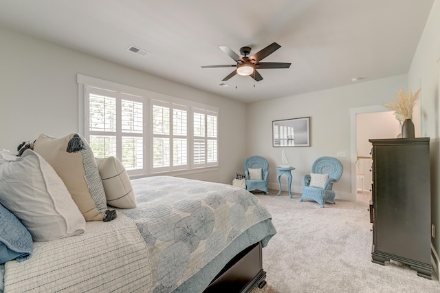 bedroom with light colored carpet and ceiling fan