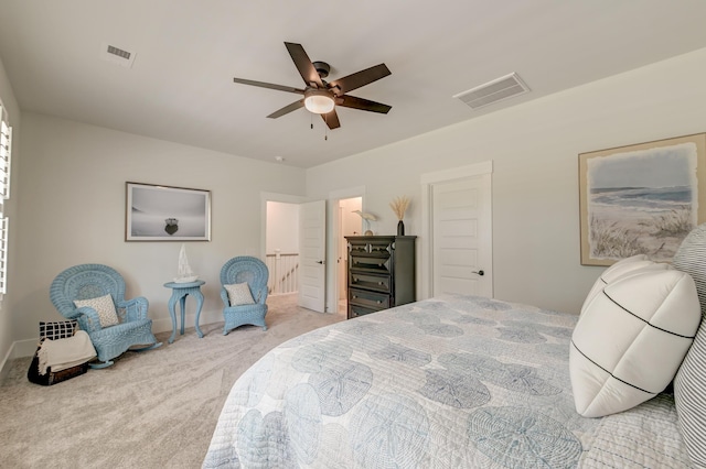 bedroom with light carpet and ceiling fan