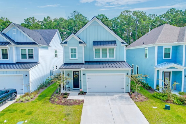 modern inspired farmhouse with a garage and a front yard