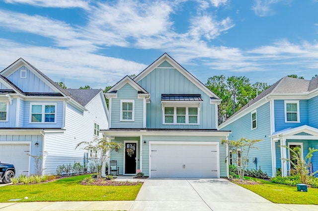 craftsman house featuring a garage and a front lawn