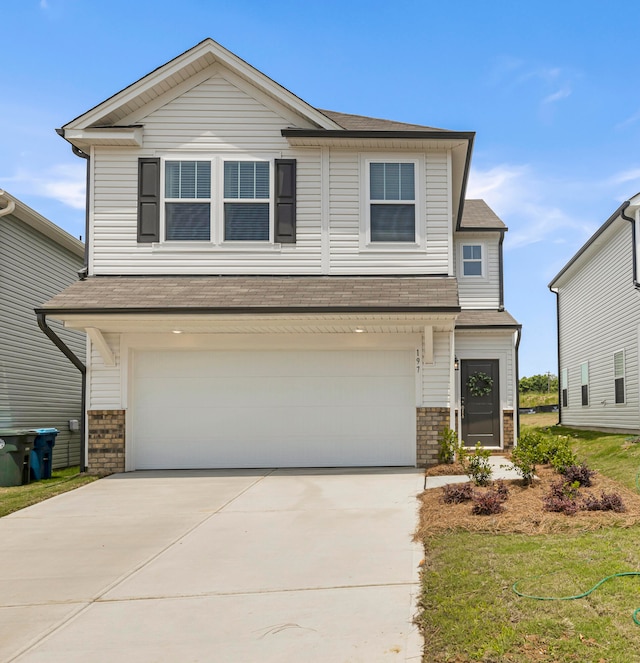 view of front of property featuring a garage