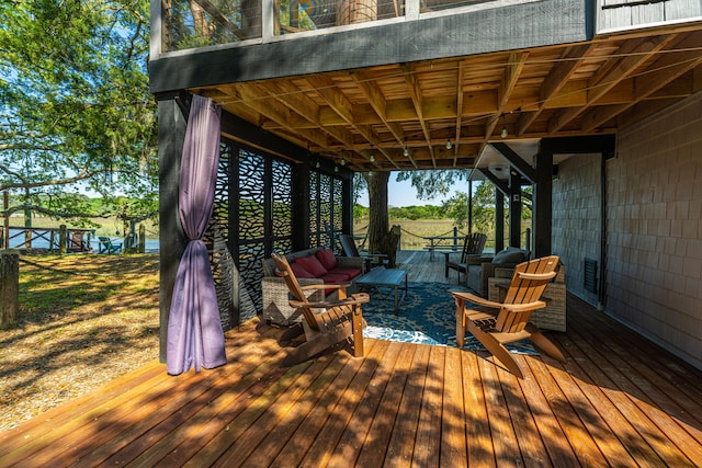 deck with an outdoor hangout area