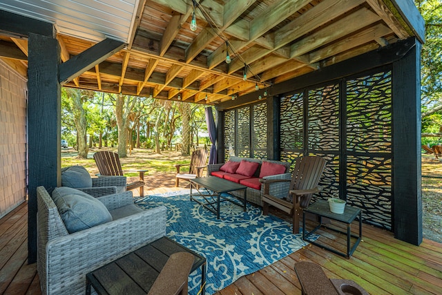 wooden terrace featuring outdoor lounge area