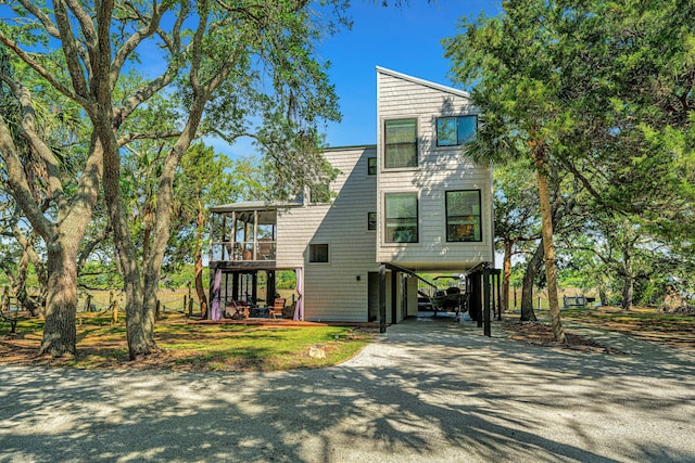 view of front facade with a carport