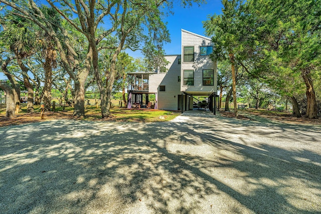 exterior space with a carport