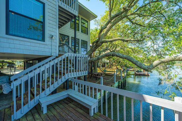 view of dock with a water view