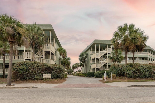 view of outdoor building at dusk