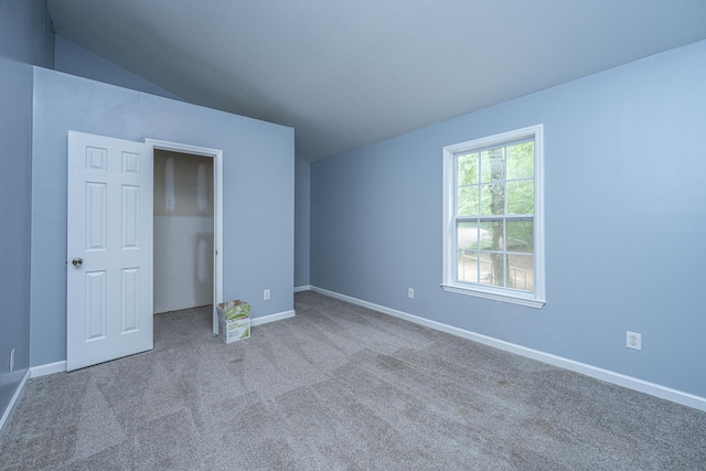 312 Piney Grove Rd, Cross, SC 29436 - unfurnished bedroom with vaulted ceiling, carpet floors, and baseboards