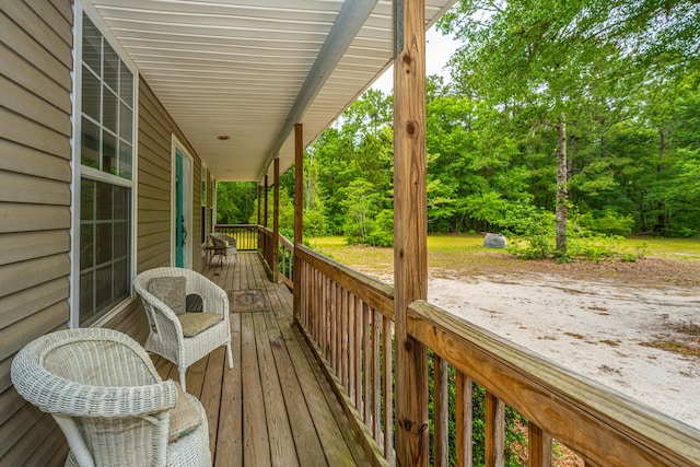 312 Piney Grove Rd, Cross, SC 29436 - wooden terrace with view of wooded area