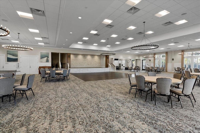 dining area featuring visible vents and wood finished floors