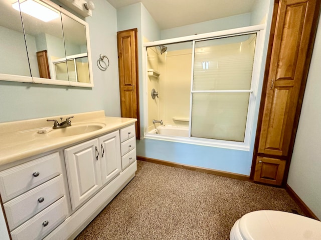 full bathroom with shower / bath combination with glass door, vanity, and toilet