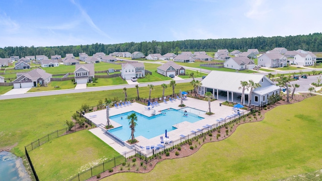 aerial perspective of suburban area with a pool area