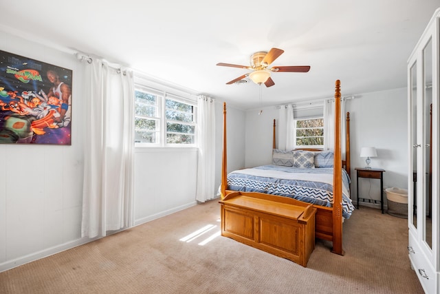 carpeted bedroom featuring a ceiling fan