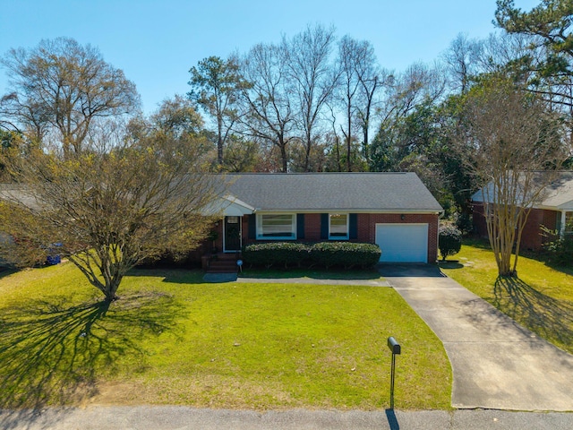 ranch-style house featuring a front lawn, an attached garage, brick siding, and driveway