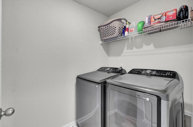 washroom featuring separate washer and dryer