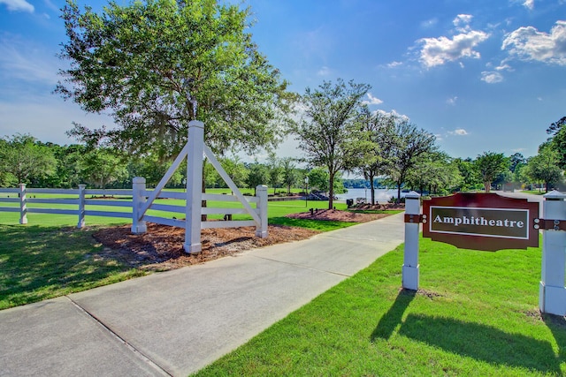 view of home's community featuring a yard